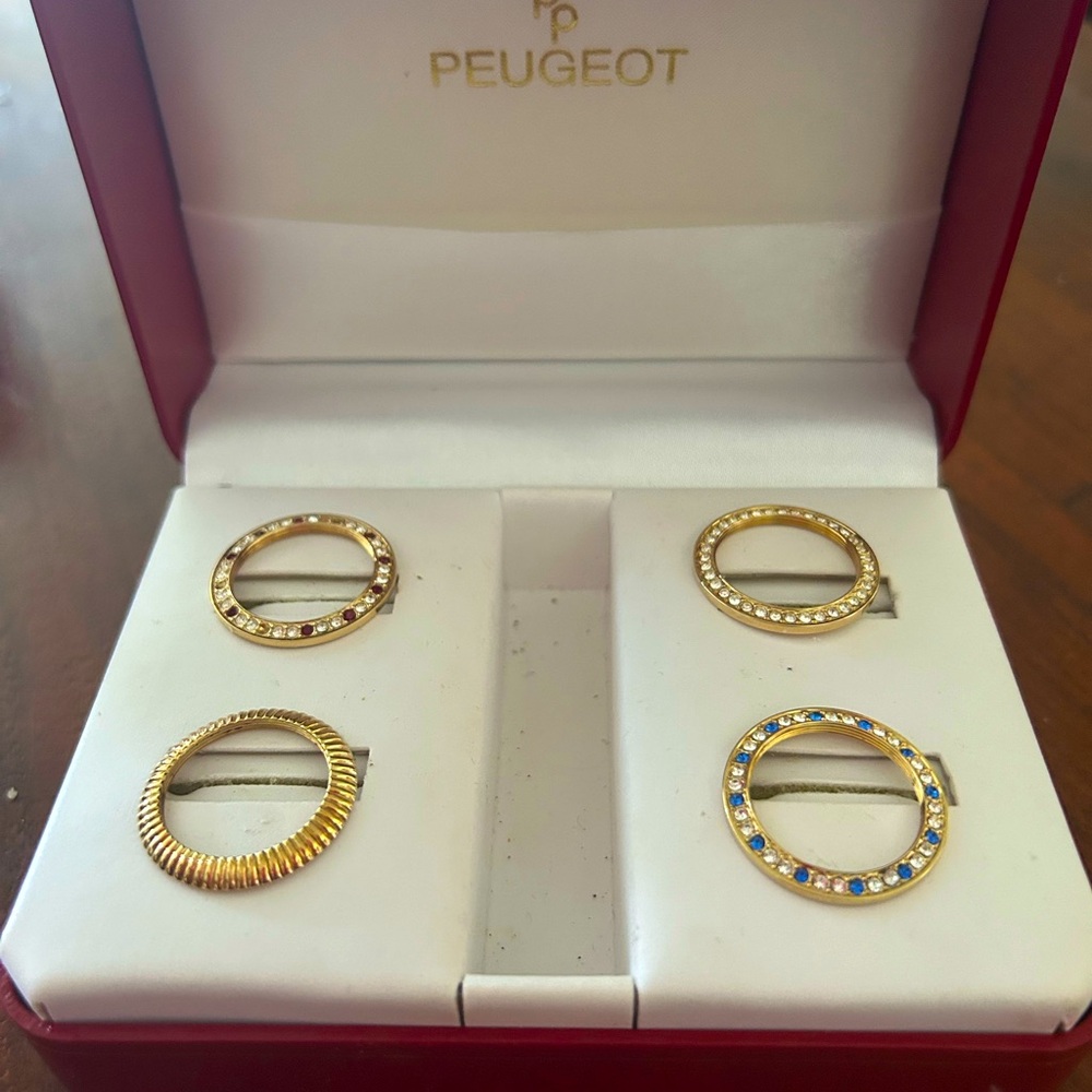 ONLY the interchangeable bezels for Peugeot watch. Very festive.